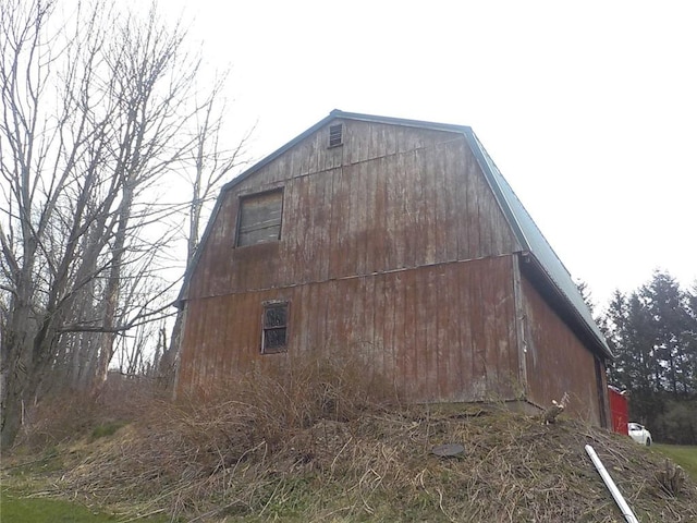 6900 White Rd, Conesus, NY 14435 - view of property exterior with a barn, an outdoor structure, and a gambrel roof