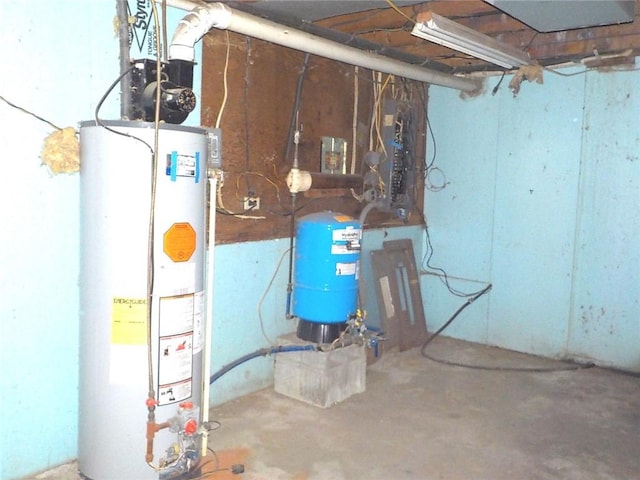 6900 White Rd, Conesus, NY 14435 - unfinished below grade area featuring gas water heater and a water pressure tank