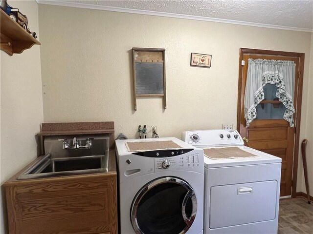 8584 Vieley Rd, Campbell, NY 14821 - washroom with washer and dryer, crown molding, and a textured ceiling