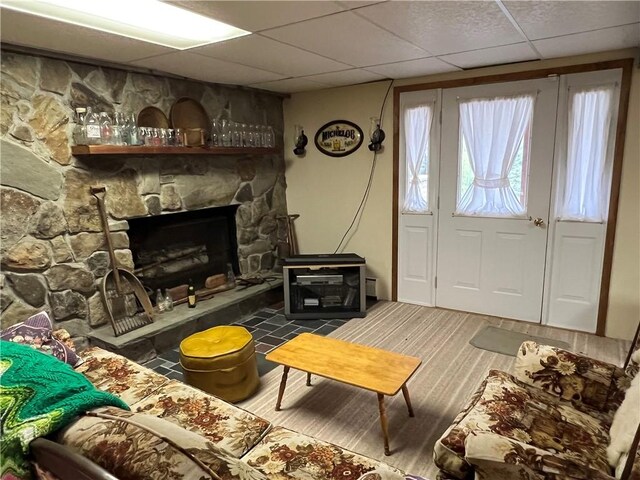 8584 Vieley Rd, Campbell, NY 14821 - carpeted living room with a drop ceiling and a fireplace