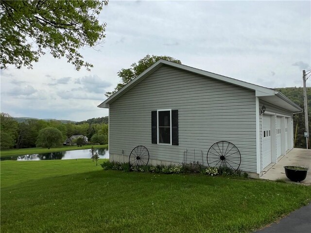 8584 Vieley Rd, Campbell, NY 14821 - view of home's exterior with a water view, a yard, and driveway