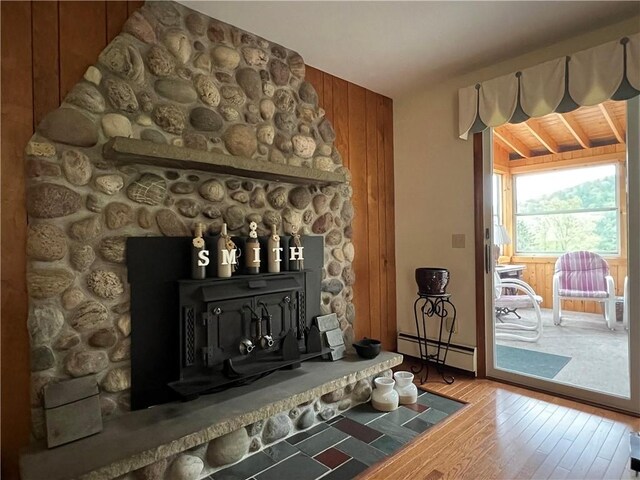 8584 Vieley Rd, Campbell, NY 14821 - detailed view of wood finished floors and a baseboard radiator