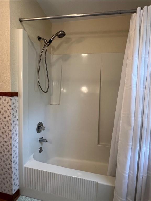 8584 Vieley Rd, Campbell, NY 14821 - bathroom with shower / bathtub combination with curtain