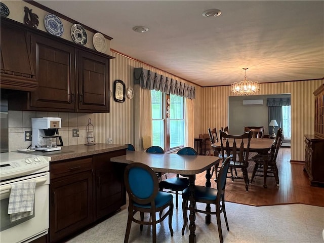 8584 Vieley Rd, Campbell, NY 14821 - dining room featuring a chandelier, a wall mounted AC, and light wood-style floors