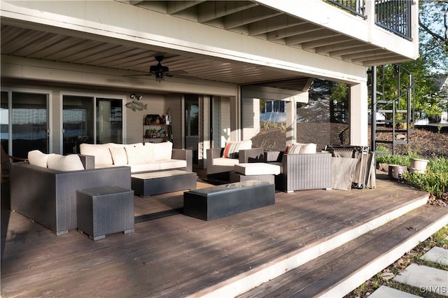 5598 Buck Point Rd, Fleming, NY 13021 - wooden deck featuring outdoor lounge area and ceiling fan