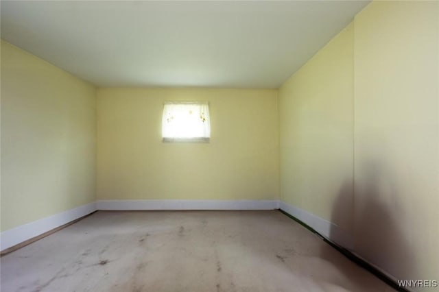 7233 Ridge Rd, Newfane, NY 14094 - spare room featuring baseboards and unfinished concrete floors