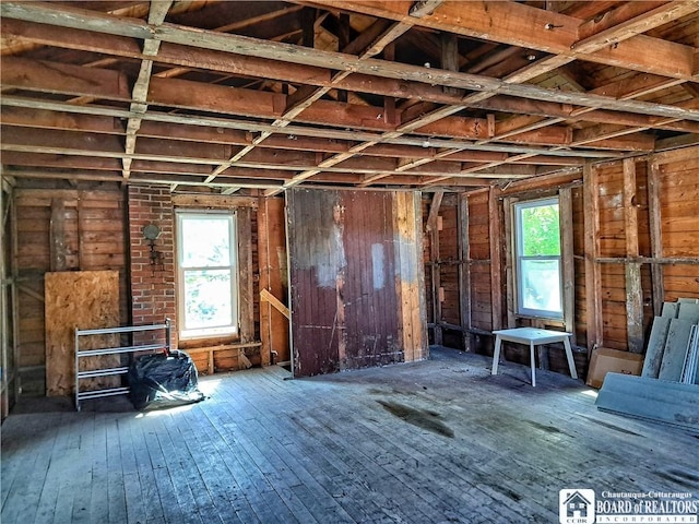55 Washington Ave, Pomfret, NY 14063 - misc room featuring hardwood / wood-style floors and wood walls