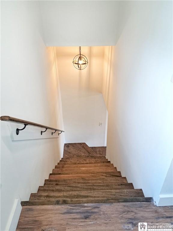 55 Washington Ave, Pomfret, NY 14063 - stairway with wood finished floors