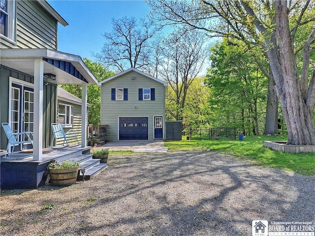 55 Washington Ave, Pomfret, NY 14063 - exterior space with a garage and fence