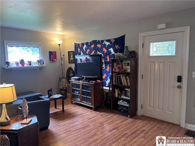 417 Charles St, Jamestown, NY 14701 - living room with wood finished floors and an office area