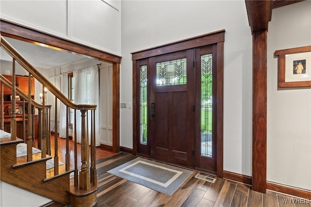 60 Kettle Run, Elma, NY 14052 - entryway featuring wood finished floors and stairway