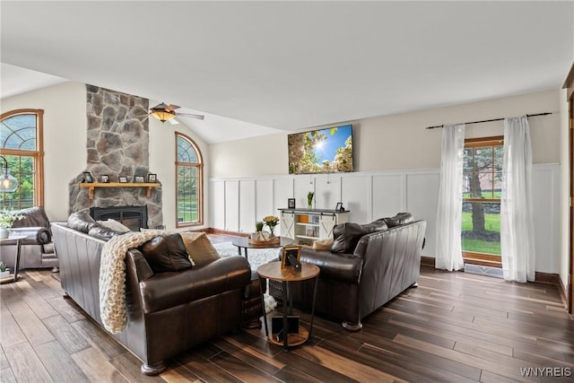 60 Kettle Run, Elma, NY 14052 - living area featuring dark wood-type flooring, wainscoting, a fireplace, a decorative wall, and ceiling fan