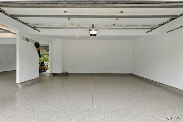 60 Kettle Run, Elma, NY 14052 - garage featuring a garage door opener and baseboards