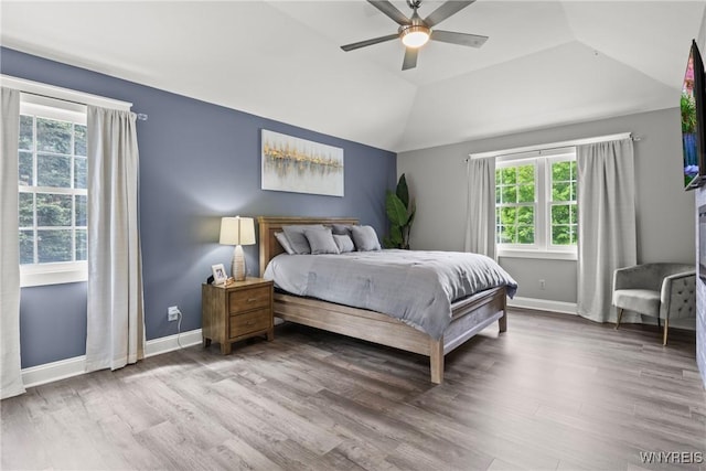 60 Kettle Run, Elma, NY 14052 - bedroom with multiple windows, wood finished floors, lofted ceiling, and a ceiling fan