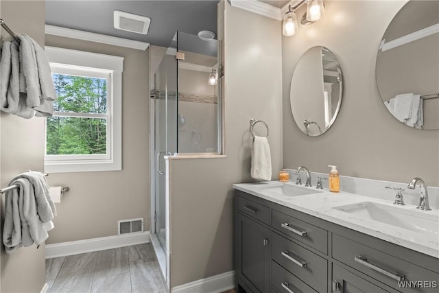 60 Kettle Run, Elma, NY 14052 - full bathroom featuring double vanity, crown molding, a stall shower, and marble finish flooring