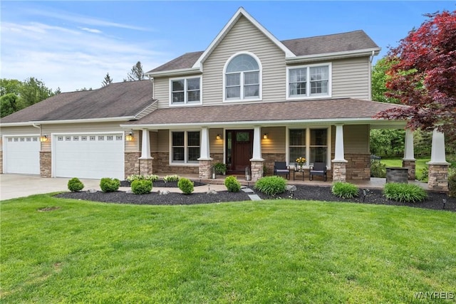 60 Kettle Run, Elma, NY 14052 - view of front of house featuring a porch, driveway, a front yard, and an attached garage