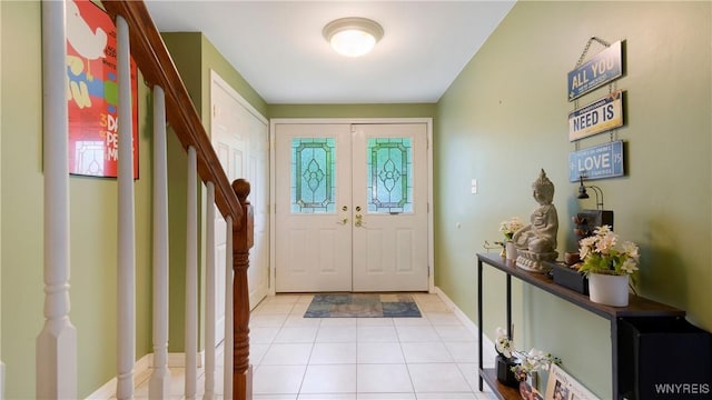 223 Patrice Ter, Amherst, NY 14221 - entrance foyer featuring stairs, light tile patterned floors, and baseboards
