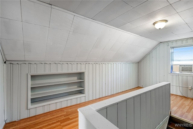4233 Crescent Dr, Niagara Falls, NY 14305 - hall with wood finished floors, lofted ceiling, and cooling unit
