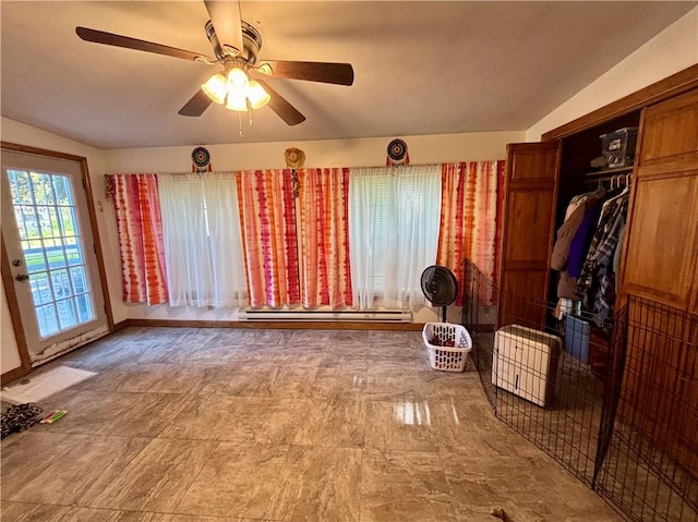 99 N Main St, Mount Morris, NY 14510 - living room featuring a ceiling fan, vaulted ceiling, a baseboard radiator, and baseboards