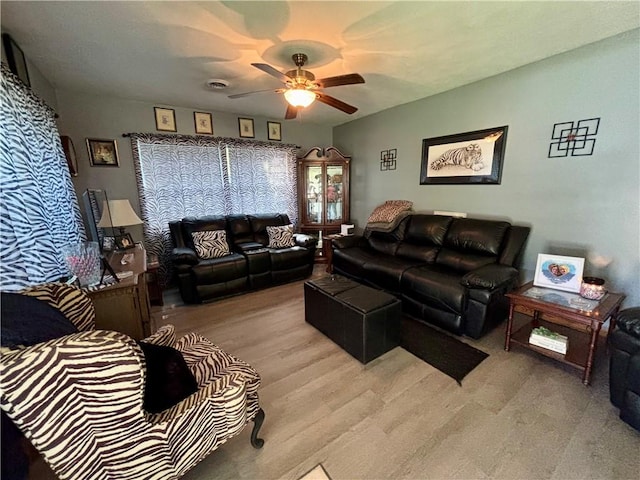 99 N Main St, Mount Morris, NY 14510 - living area featuring a ceiling fan and wood finished floors