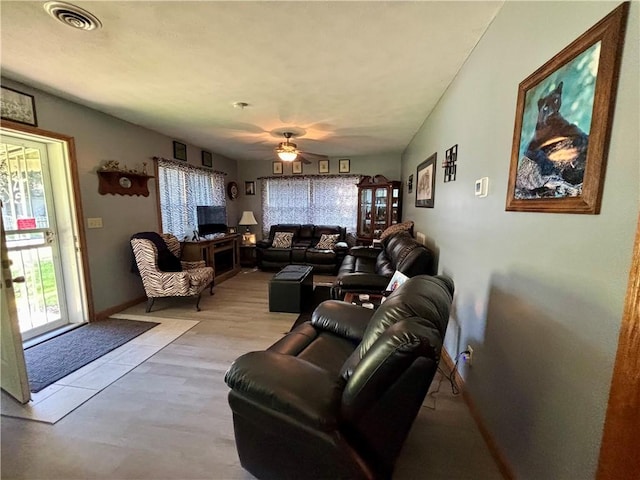 99 N Main St, Mount Morris, NY 14510 - living room with a ceiling fan and baseboards
