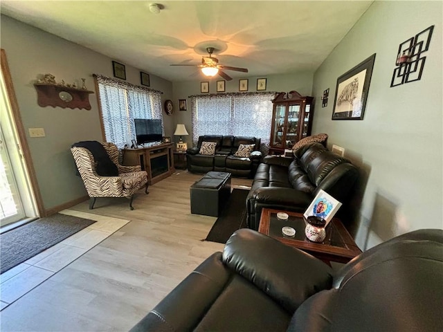99 N Main St, Mount Morris, NY 14510 - living room with a ceiling fan, light wood-style flooring, and baseboards