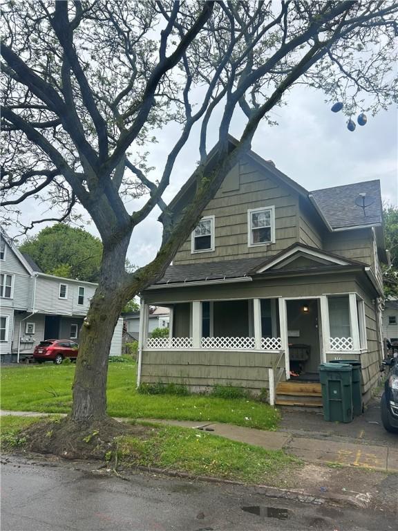 160 Emerson St, Rochester, NY 14613 - view of front facade with a shingled roof