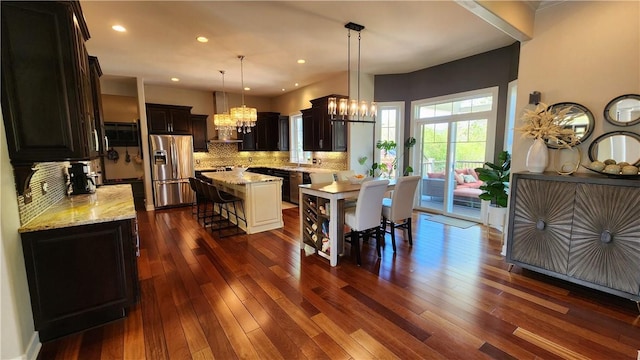 31 Putney Pl, Greece, NY 14468 - dining space with a chandelier, dark wood-type flooring, and recessed lighting