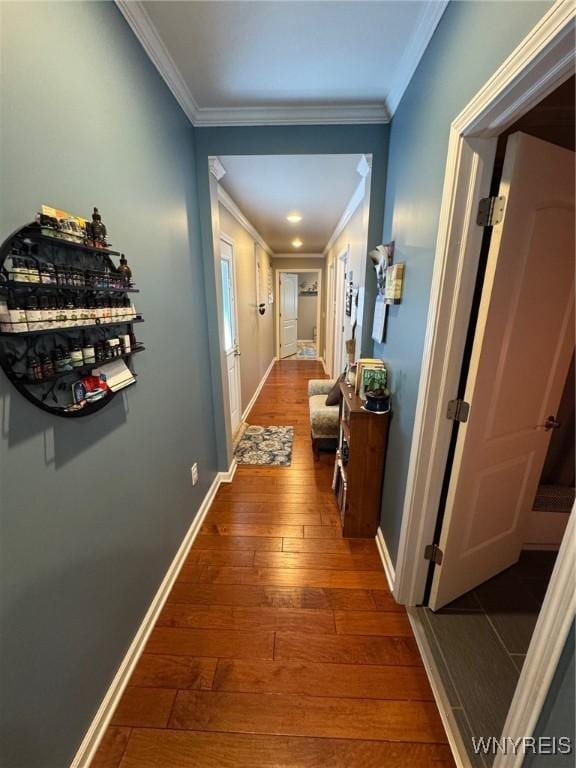 9 N Hartland St, Royalton, NY 14105 - hallway with ornamental molding, wood-type flooring, and baseboards
