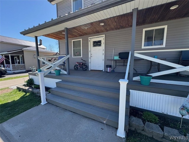 9 N Hartland St, Royalton, NY 14105 - view of exterior entry featuring covered porch
