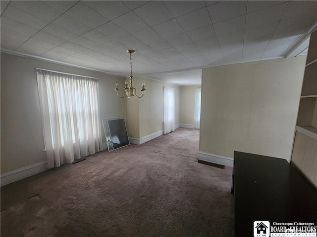 69 Royal Ave, Jamestown, NY 14701 - unfurnished dining area with a chandelier, carpet flooring, and baseboards