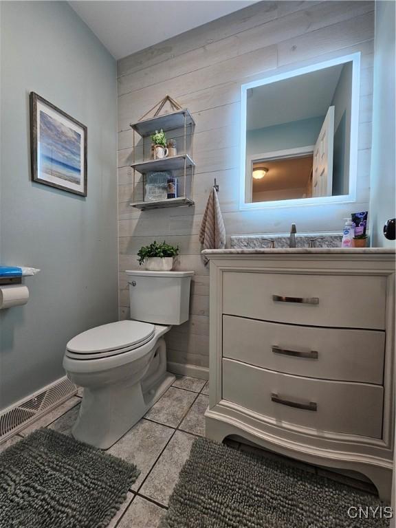 108 Sunflower Cir, Frankfort, NY 13340 - bathroom featuring toilet, tile patterned floors, and vanity