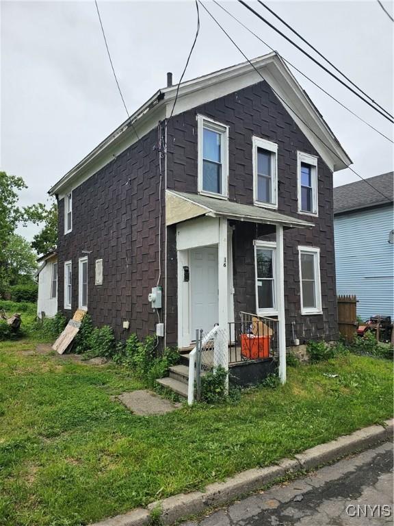 16 Barnes Ave, Utica, NY 13502 - view of front facade featuring a front yard