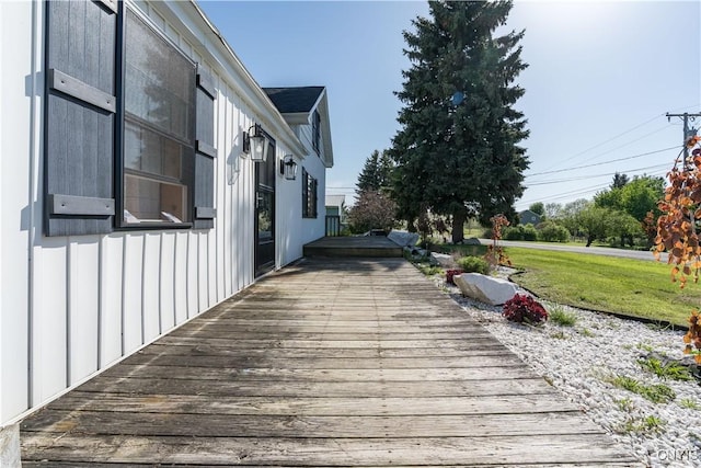 20304 Burton Rd, Hounsfield, NY 13685 - wooden deck featuring a yard