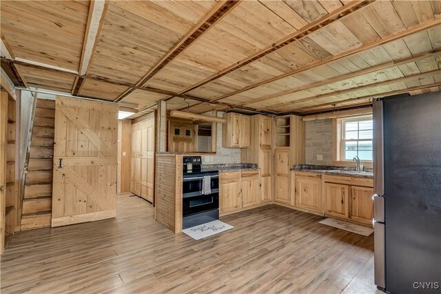 20304 Burton Rd, Hounsfield, NY 13685 - kitchen with freestanding refrigerator, range with two ovens, light brown cabinetry, a sink, and wooden ceiling