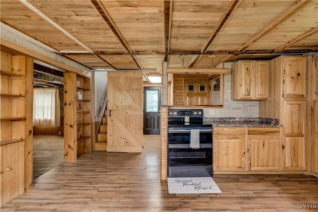 20304 Burton Rd, Hounsfield, NY 13685 - kitchen featuring range with electric stovetop, light brown cabinetry, dark countertops, tasteful backsplash, and light wood-type flooring