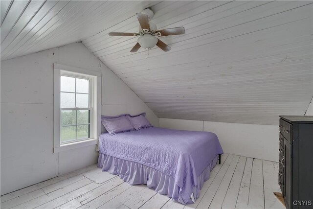 20304 Burton Rd, Hounsfield, NY 13685 - bedroom featuring lofted ceiling, light wood finished floors, ceiling fan, and wooden ceiling