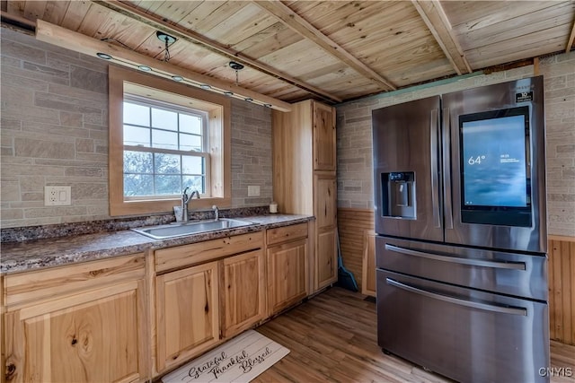 20304 Burton Rd, Hounsfield, NY 13685 - kitchen with stainless steel fridge, a sink, wooden ceiling with exposed beams, dark countertops, and wood finished floors