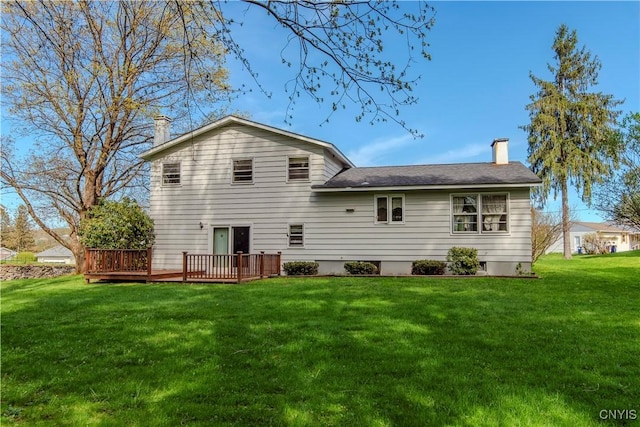 18 Court Knolle, New Hartford, NY 13413 - back of house with a wooden deck, a yard, a chimney, and a shingled roof