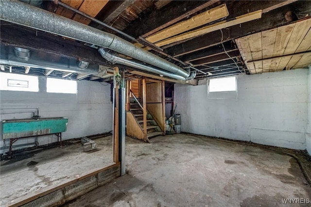 below grade area with a sink and stairway