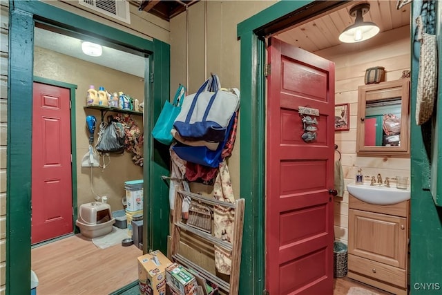 view of exterior entry with a sink