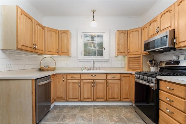 kitchen featuring stainless steel appliances, a sink, decorative backsplash, light countertops, and ornamental molding