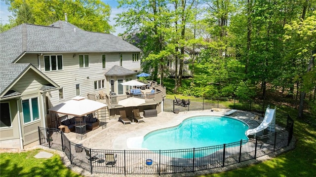 7 Mount View Cres, Penfield, NY 14580 - view of pool featuring a water slide, a gazebo, a patio, and outdoor lounge area