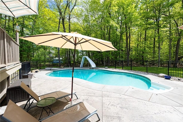 7 Mount View Cres, Penfield, NY 14580 - view of pool with a water slide, a patio, a fenced backyard, and a diving board