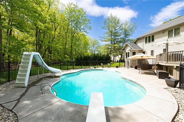 7 Mount View Cres, Penfield, NY 14580 - view of swimming pool with a water slide, a diving board, and a patio area