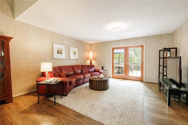 7 Mount View Cres, Penfield, NY 14580 - living room with wood finished floors, french doors, and baseboards