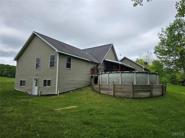 437 Nye Rd, Virgil, NY 13045 - rear view of property with a lawn and roof with shingles