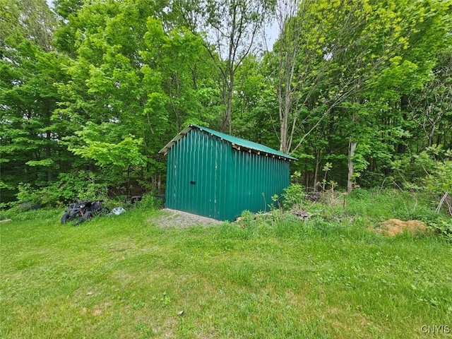 437 Nye Rd, Virgil, NY 13045 - view of shed featuring a forest view