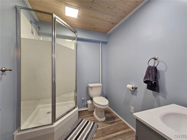 437 Nye Rd, Virgil, NY 13045 - bathroom featuring a stall shower, wood ceiling, wood finished floors, toilet, and vanity