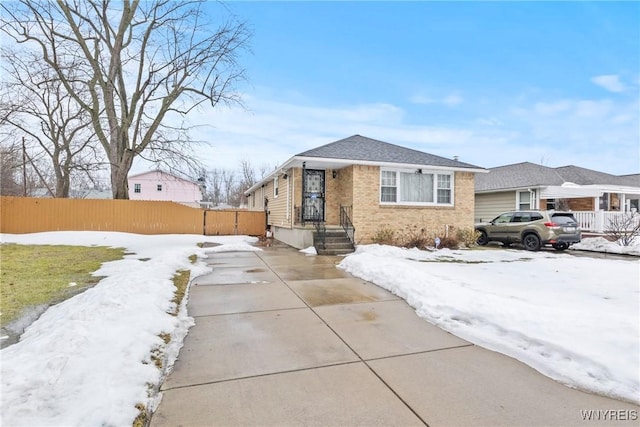 152 Nicholson St, Buffalo, NY 14216 - bungalow with brick siding and concrete driveway